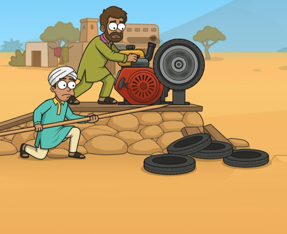 Wheel Out — двое мужчин раскручивают маховик двигателя, чтобы запустить индийское колесо